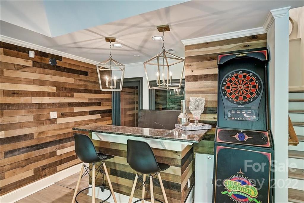 18600 Hammock Lane Davidson, NC 28036 - Photo 36 of 48 a dinning table and chairs in a room