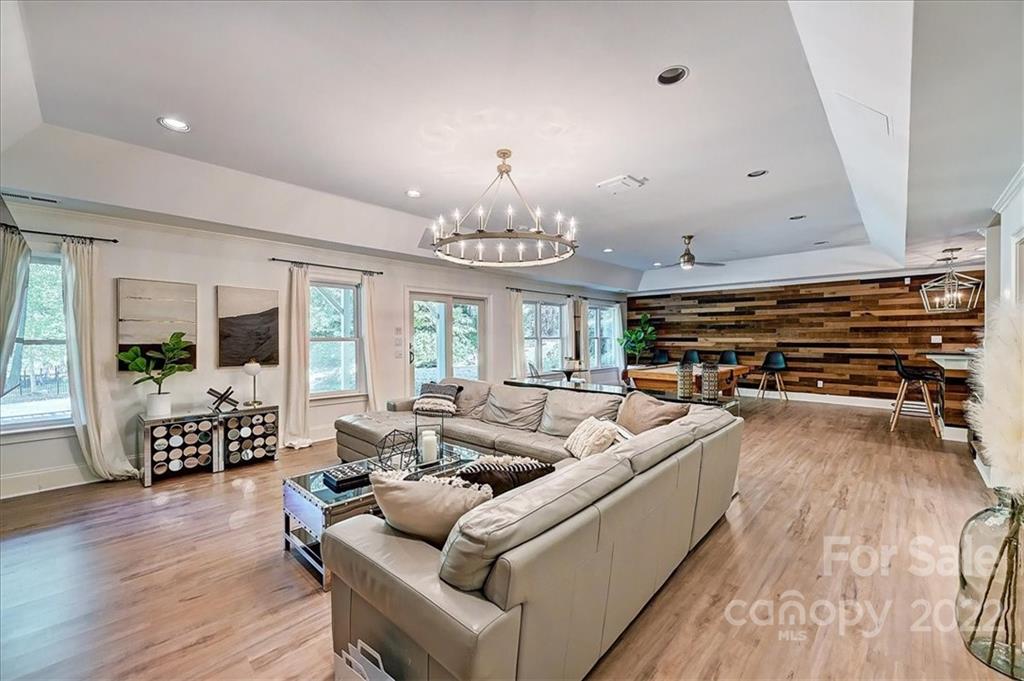 18600 Hammock Lane Davidson, NC 28036 - Photo 39 of 48 a living room with furniture and a large window
