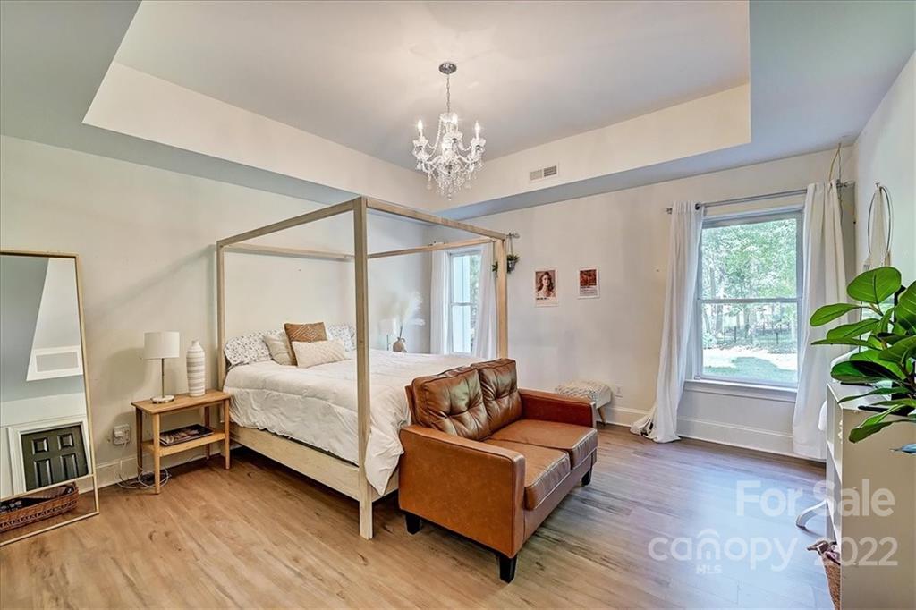 18600 Hammock Lane Davidson, NC 28036 - Photo 42 of 48 a living room with furniture fireplace and windows