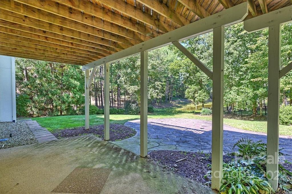 18600 Hammock Lane Davidson, NC 28036 - Photo 46 of 48 a view of a porch with a backyard