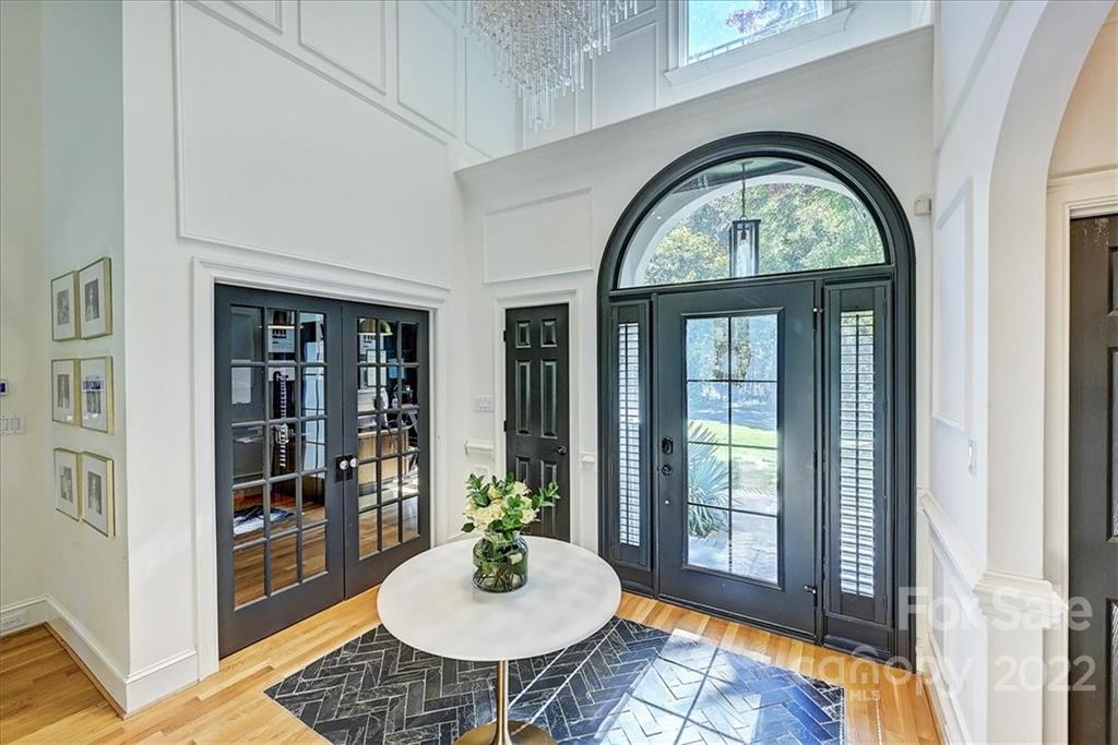 18600 Hammock Lane Davidson, NC 28036 - Photo 6 of 48 a view of a livingroom with furniture window and wooden floor