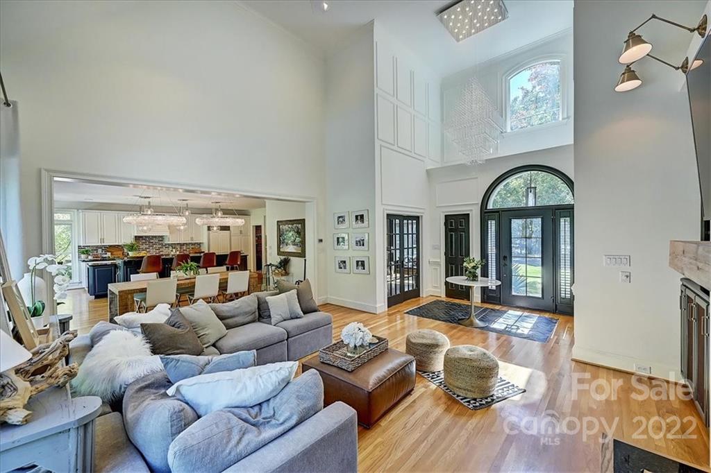 18600 Hammock Lane Davidson, NC 28036 - Photo 9 of 48 a living room with furniture fireplace and wooden floor