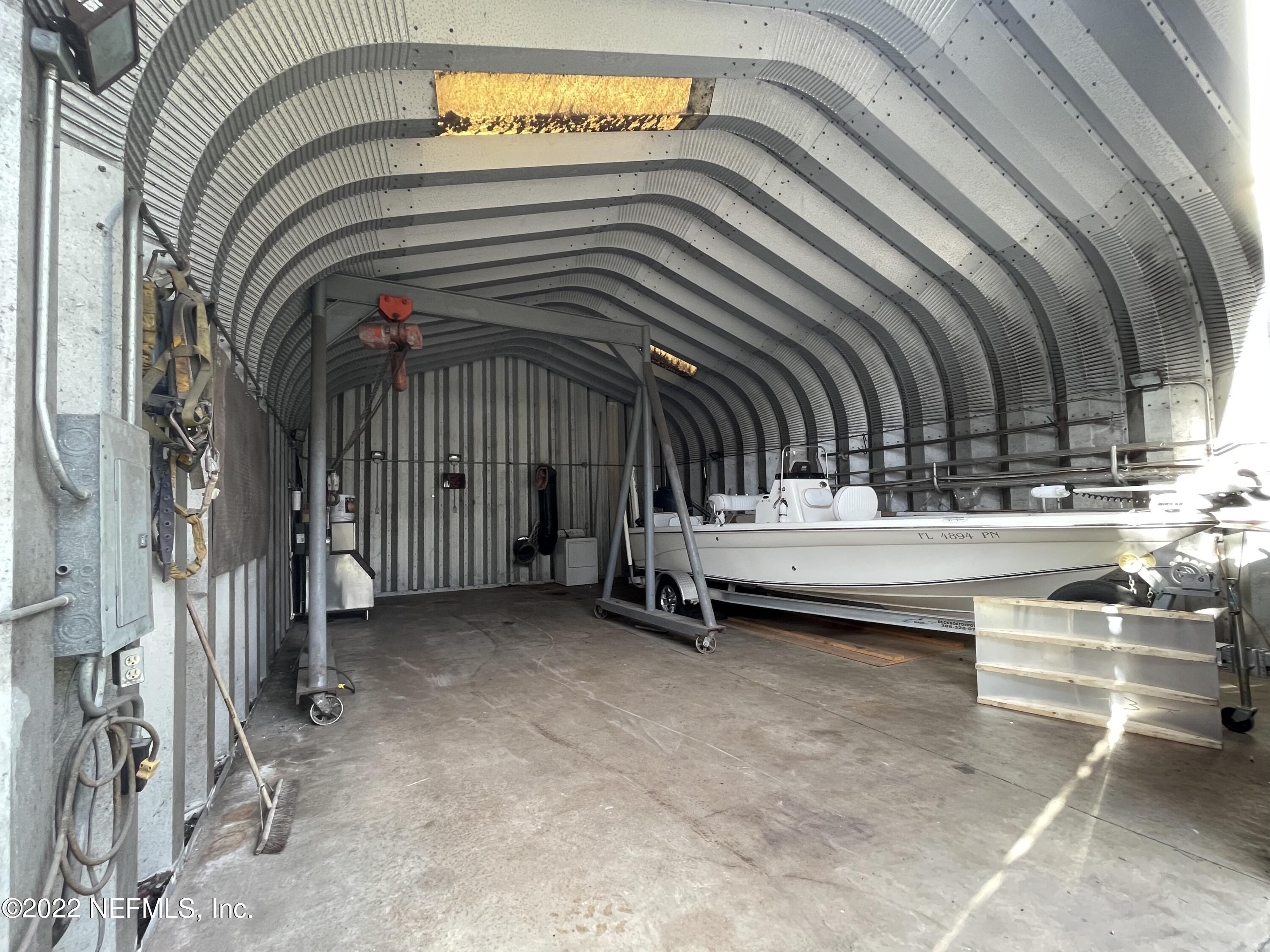 116 Comer Road Palatka, FL 32177 - Photo 24 of 51 a view of water heater room with stairs
