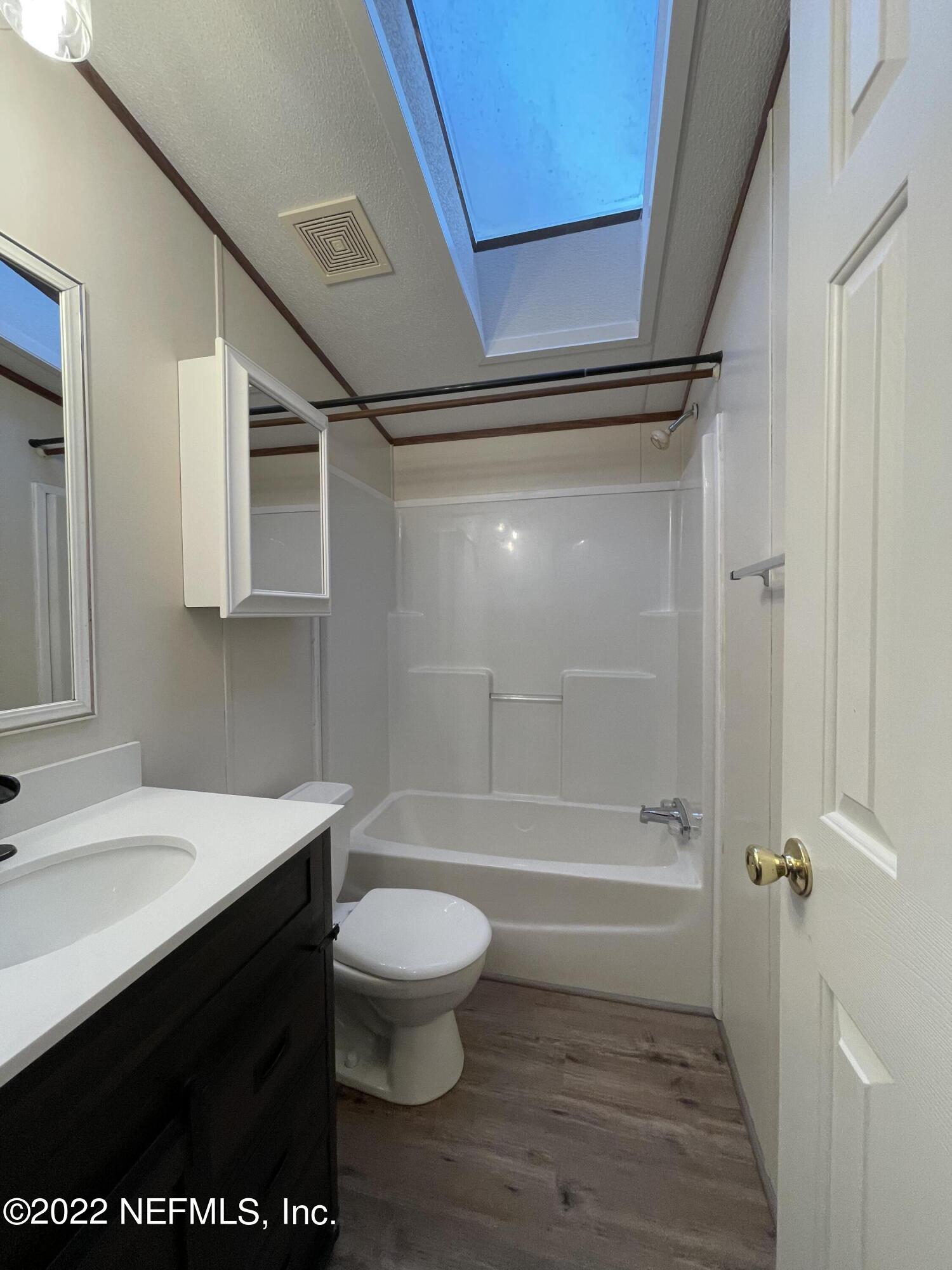 116 Comer Road Palatka, FL 32177 - Photo 38 of 51 a bathroom with a sink a toilet and shower