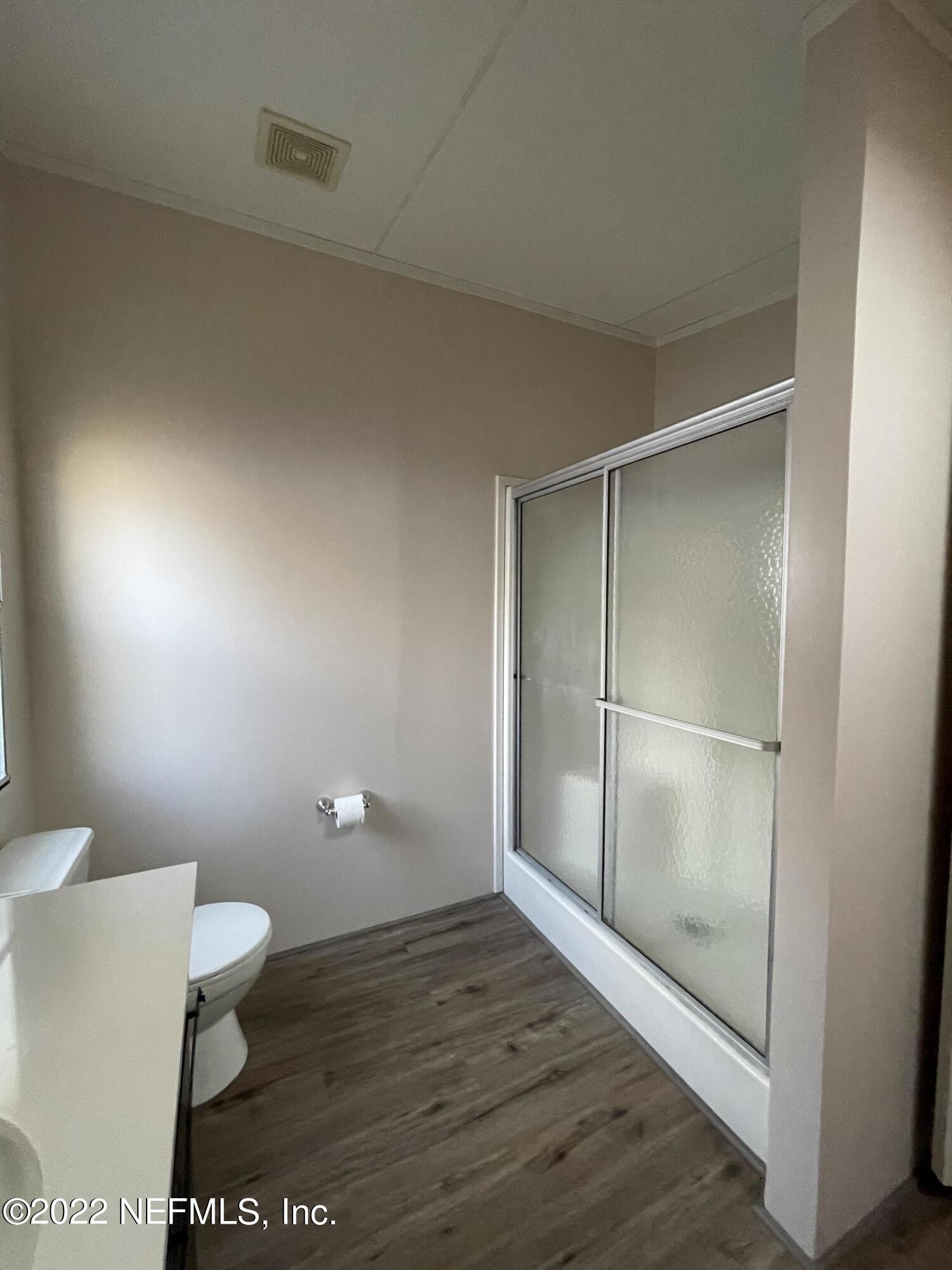 116 Comer Road Palatka, FL 32177 - Photo 44 of 51 a bathroom with a toilet and a shower