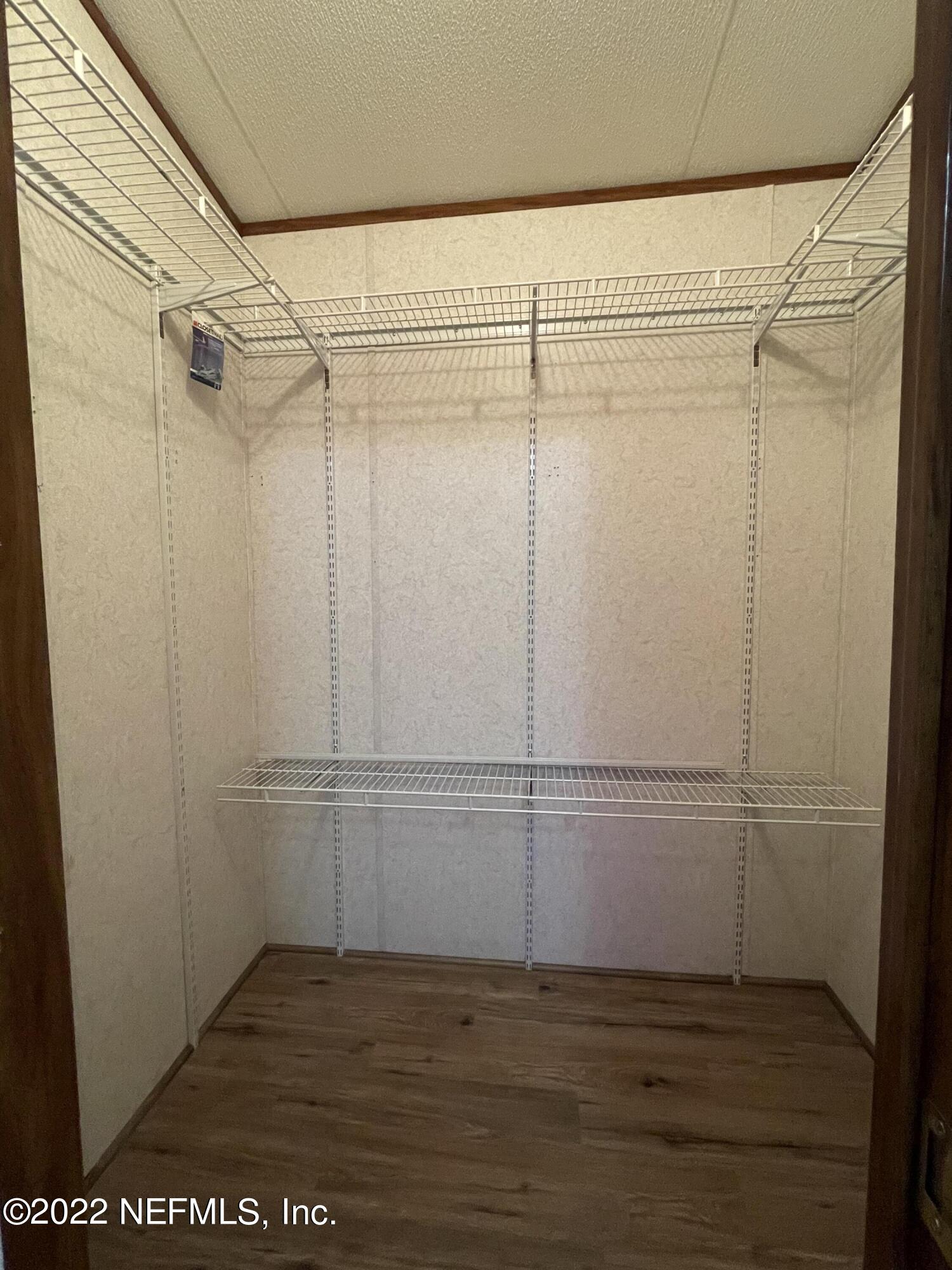 116 Comer Road Palatka, FL 32177 - Photo 48 of 51 a view of an empty walk in closet