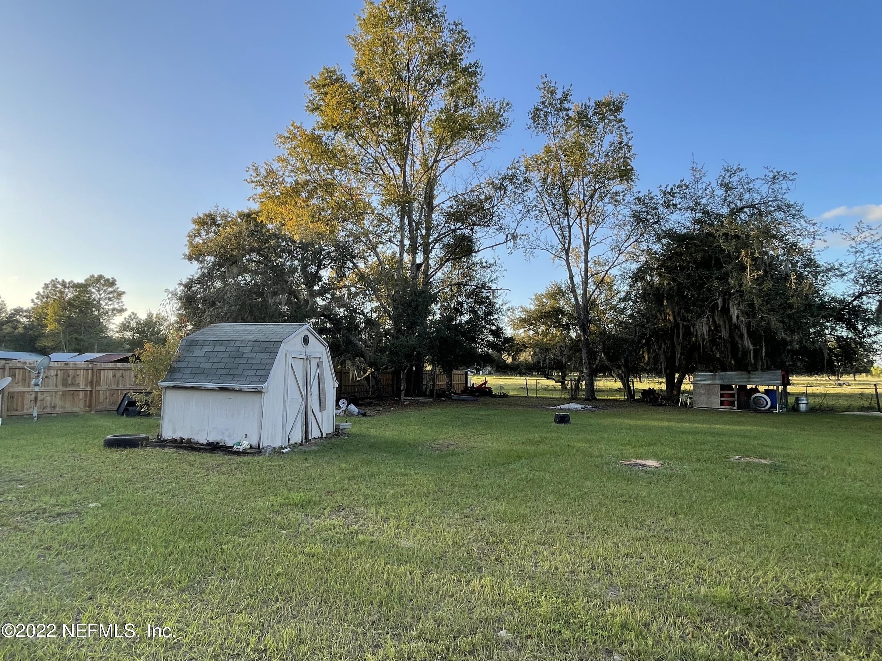 116 Comer Road Palatka, FL 32177 - Photo 9 of 51 a view of a park with large trees