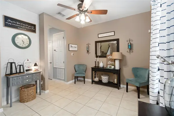 a room with furniture and a mirror