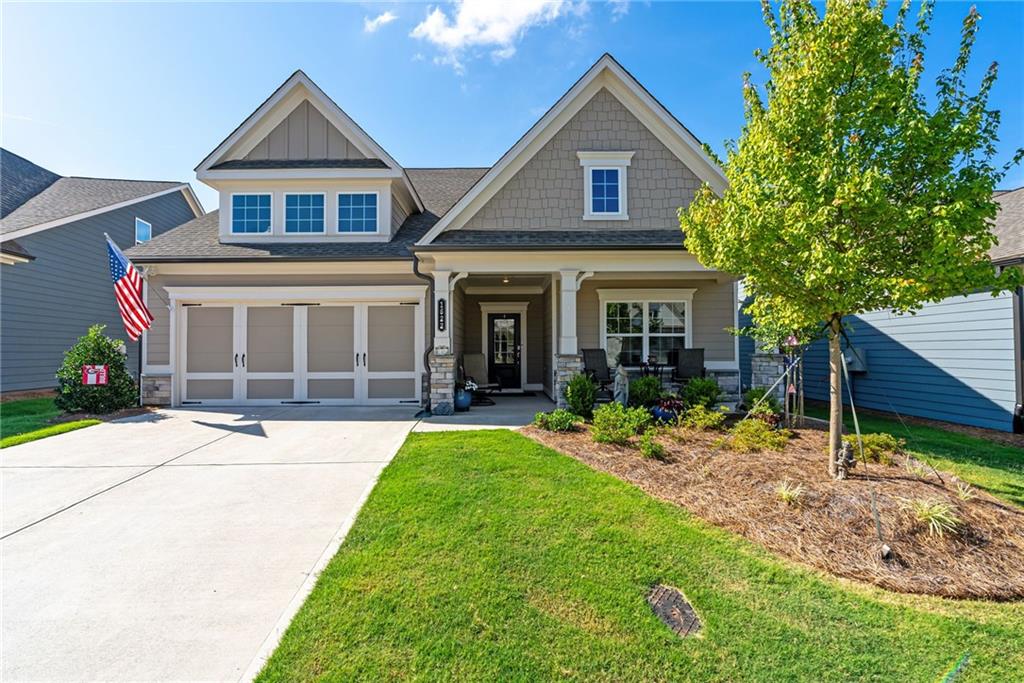 front view of a house with a yard