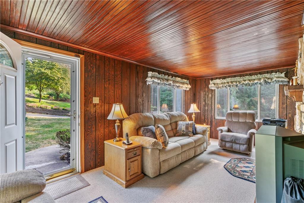 1031 Anderson Road Pittsburgh, PA 15209 - Photo 12 of 35 a living room with furniture and a large window