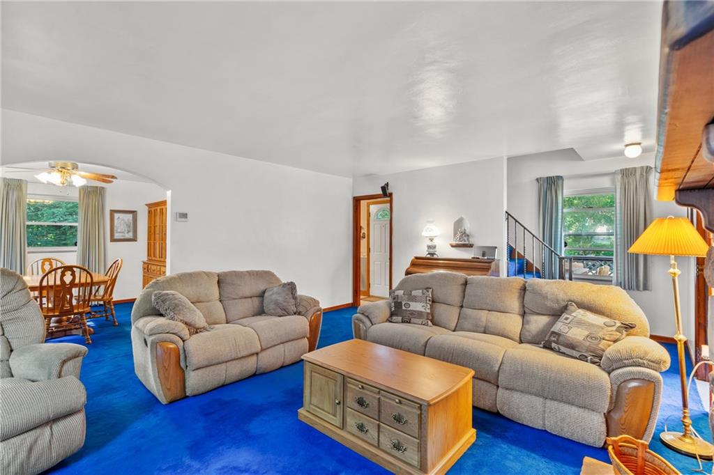 1031 Anderson Road Pittsburgh, PA 15209 - Photo 17 of 35 a living room with furniture and a couch