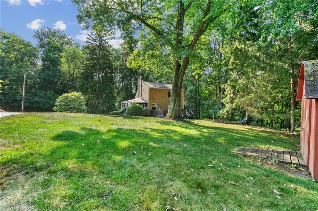 1031 Anderson Road Pittsburgh, PA 15209 - Photo 28 of 35 a view of a backyard with a garden