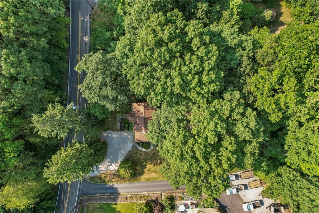 1031 Anderson Road Pittsburgh, PA 15209 - Photo 3 of 35 an aerial view of a house with a yard and covered with trees