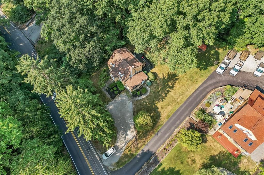 1031 Anderson Road Pittsburgh, PA 15209 - Photo 4 of 35 an aerial view of a house a garden and lake view