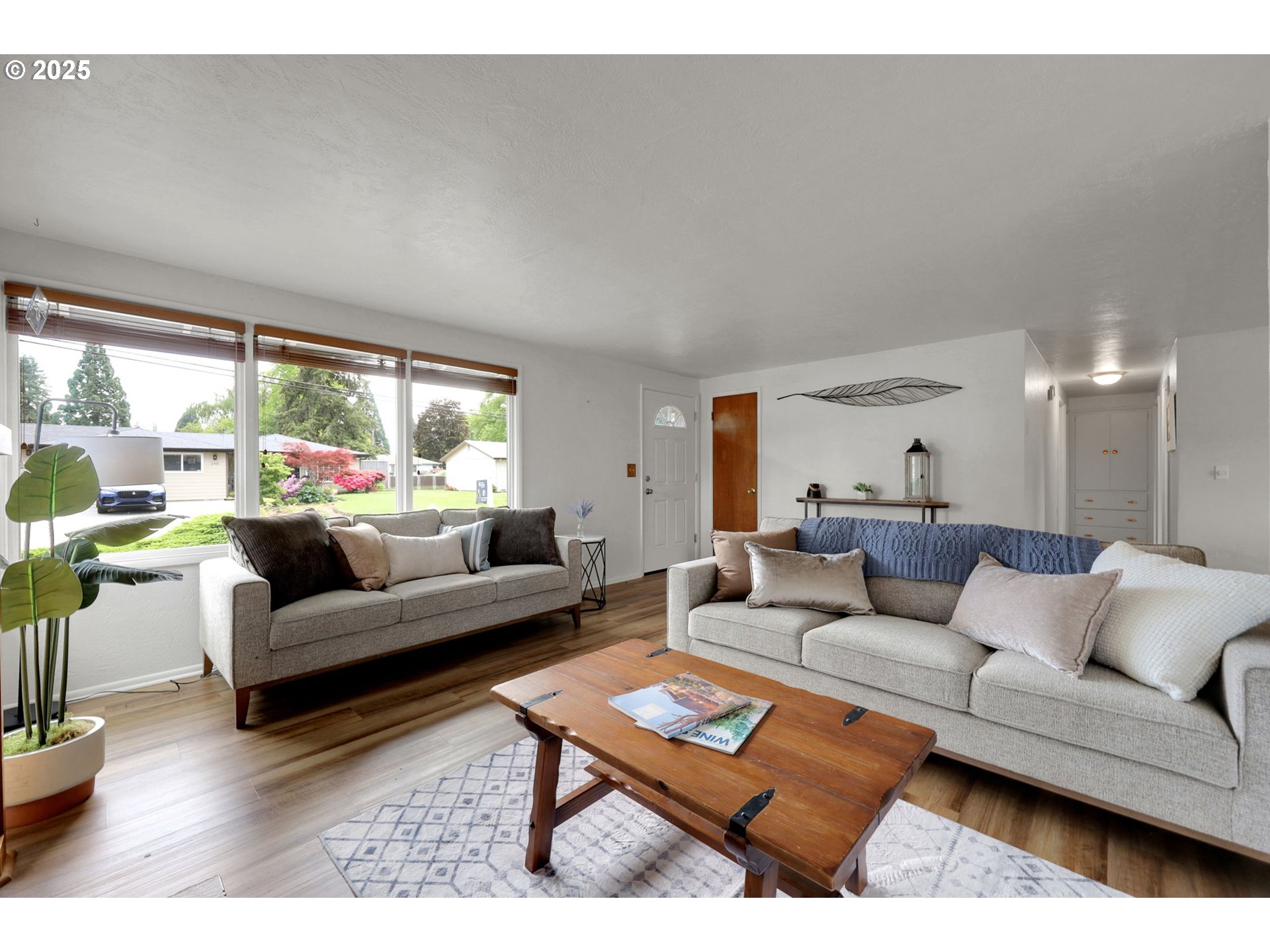 225 Banton Avenue Eugene, OR 97404 - Photo 6 of 40 a living room with furniture and a large window