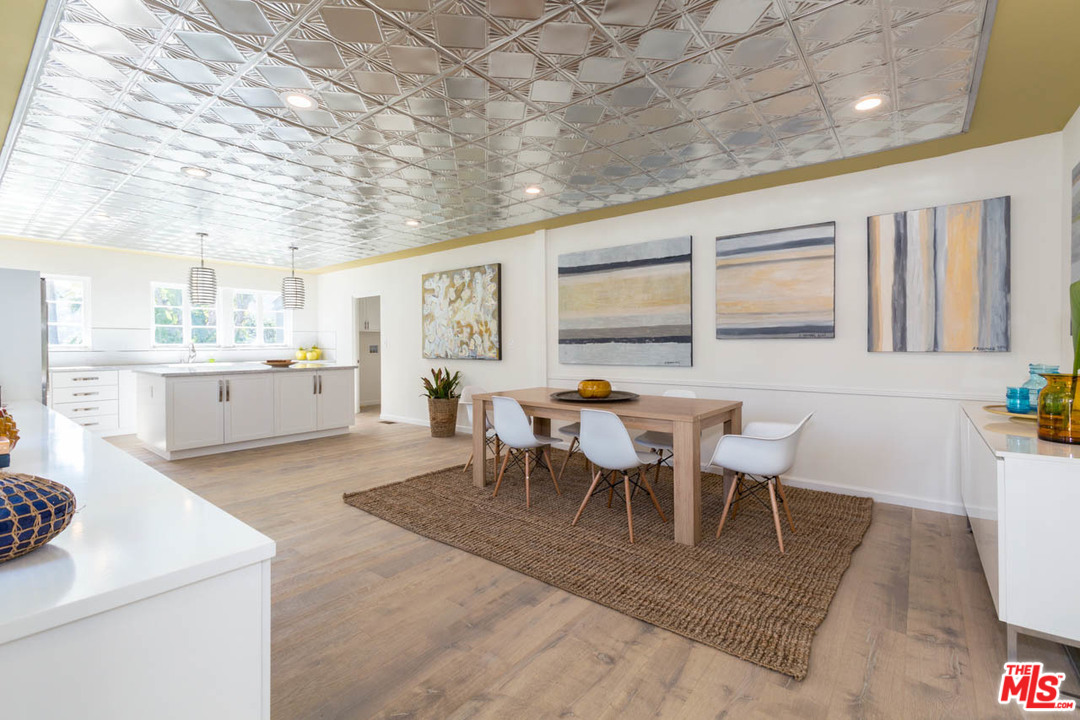 5 Richland Place Pasadena, CA 91103 - Photo 11 of 54 a view of a dining room with furniture and chandelier