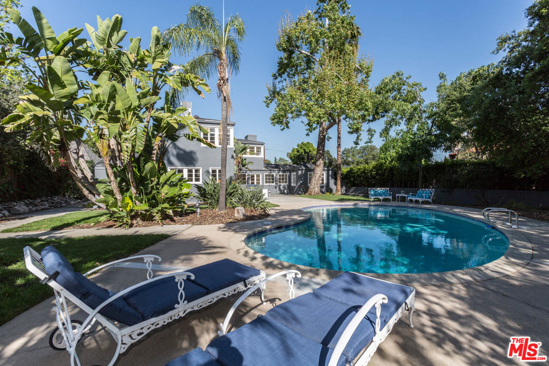 5 Richland Place Pasadena, CA 91103 - Photo 52 of 54 a view of a swimming pool with a patio