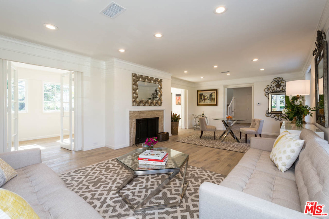5 Richland Place Pasadena, CA 91103 - Photo 10 of 54 a living room with furniture and a fireplace