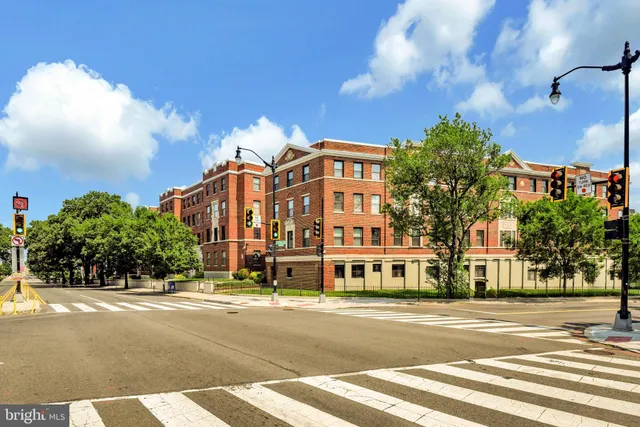 a view of a building with a street