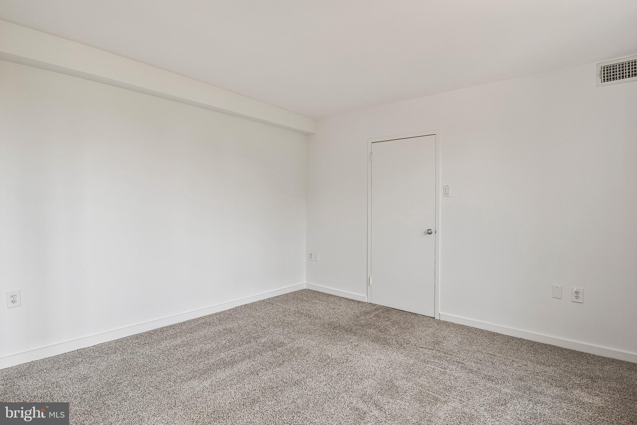 80 New York Avenue Northwest, Unit 303 Washington, DC 20001 - Photo 21 of 27 a view of an empty room