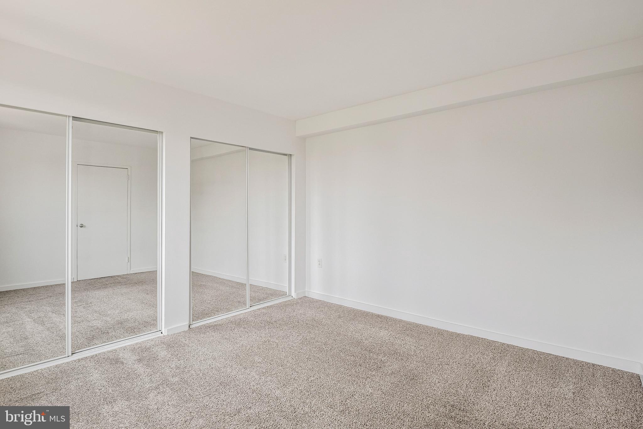 80 New York Avenue Northwest, Unit 303 Washington, DC 20001 - Photo 22 of 27 a view of an empty room