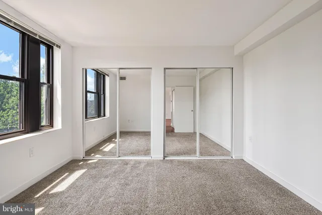 an empty room with windows