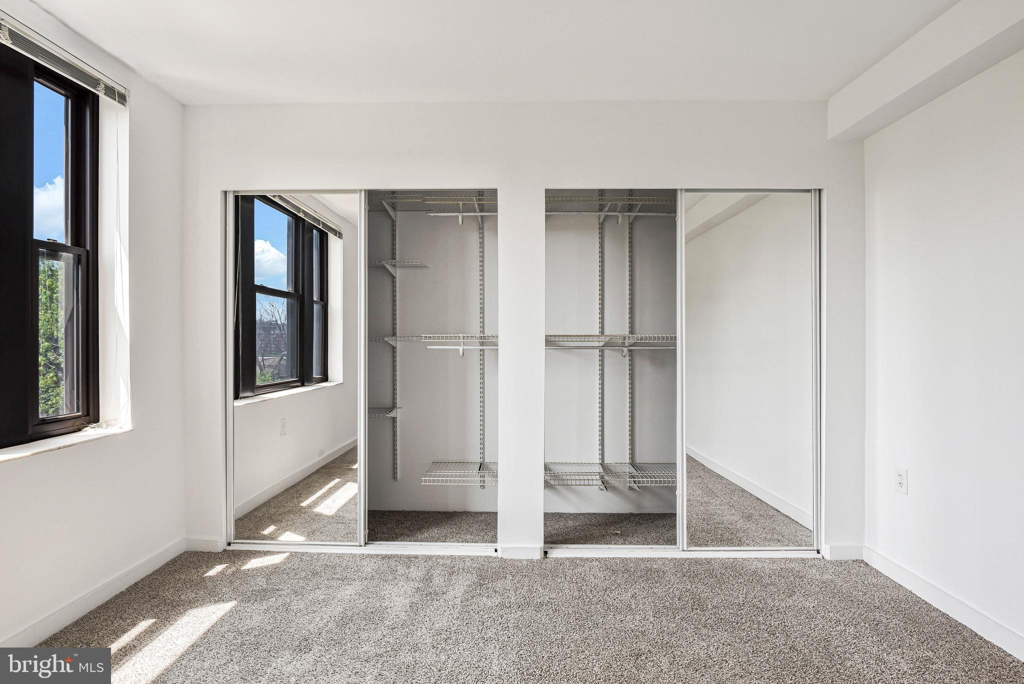 80 New York Avenue Northwest, Unit 303 Washington, DC 20001 - Photo 25 of 27 a view of entryway with wooden floor