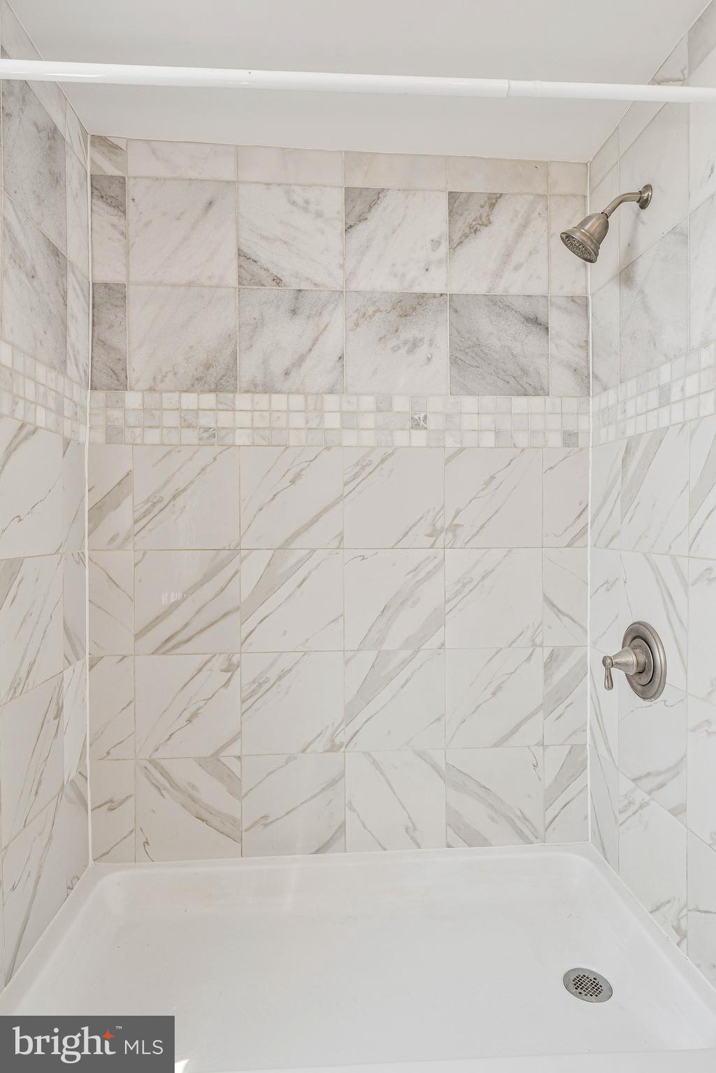 80 New York Avenue Northwest, Unit 303 Washington, DC 20001 - Photo 27 of 27 a bathroom with a shower