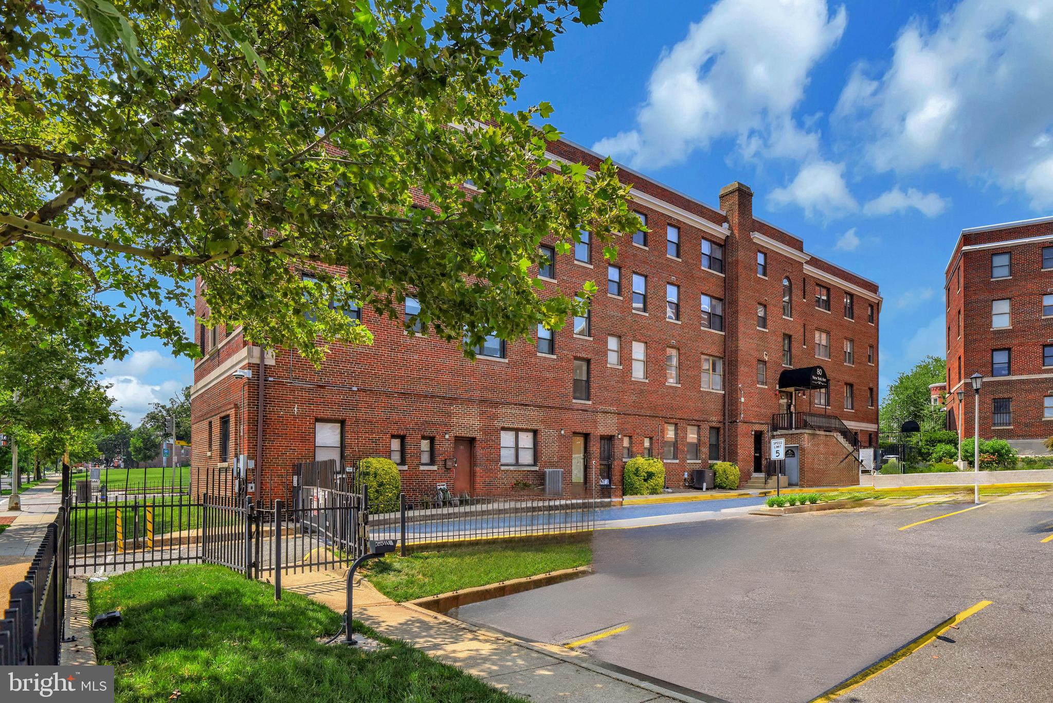 80 New York Avenue Northwest, Unit 303 Washington, DC 20001 - Photo 4 of 27 a front view of a building with garden