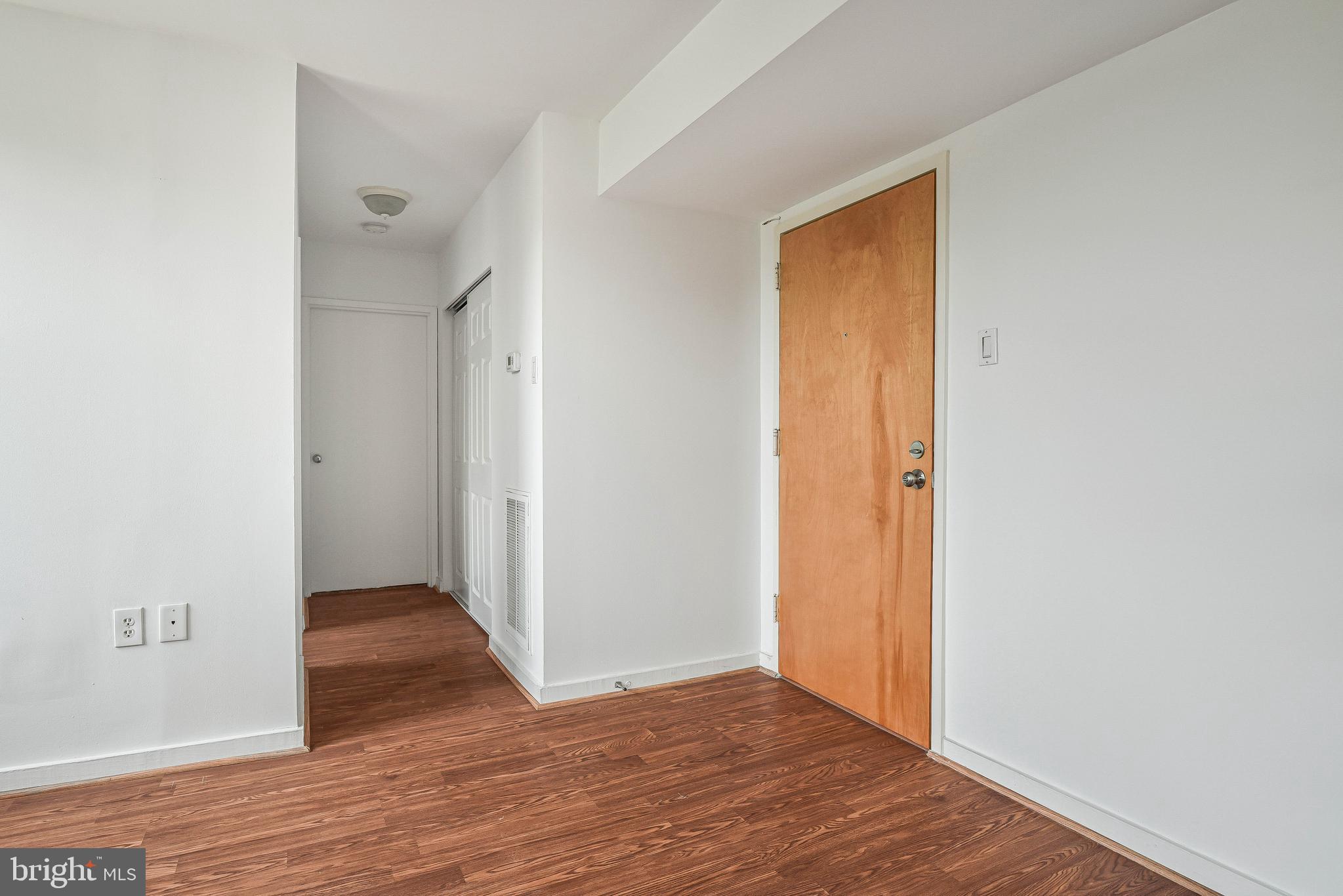 80 New York Avenue Northwest, Unit 303 Washington, DC 20001 - Photo 9 of 27 a view of hallway with wooden floor