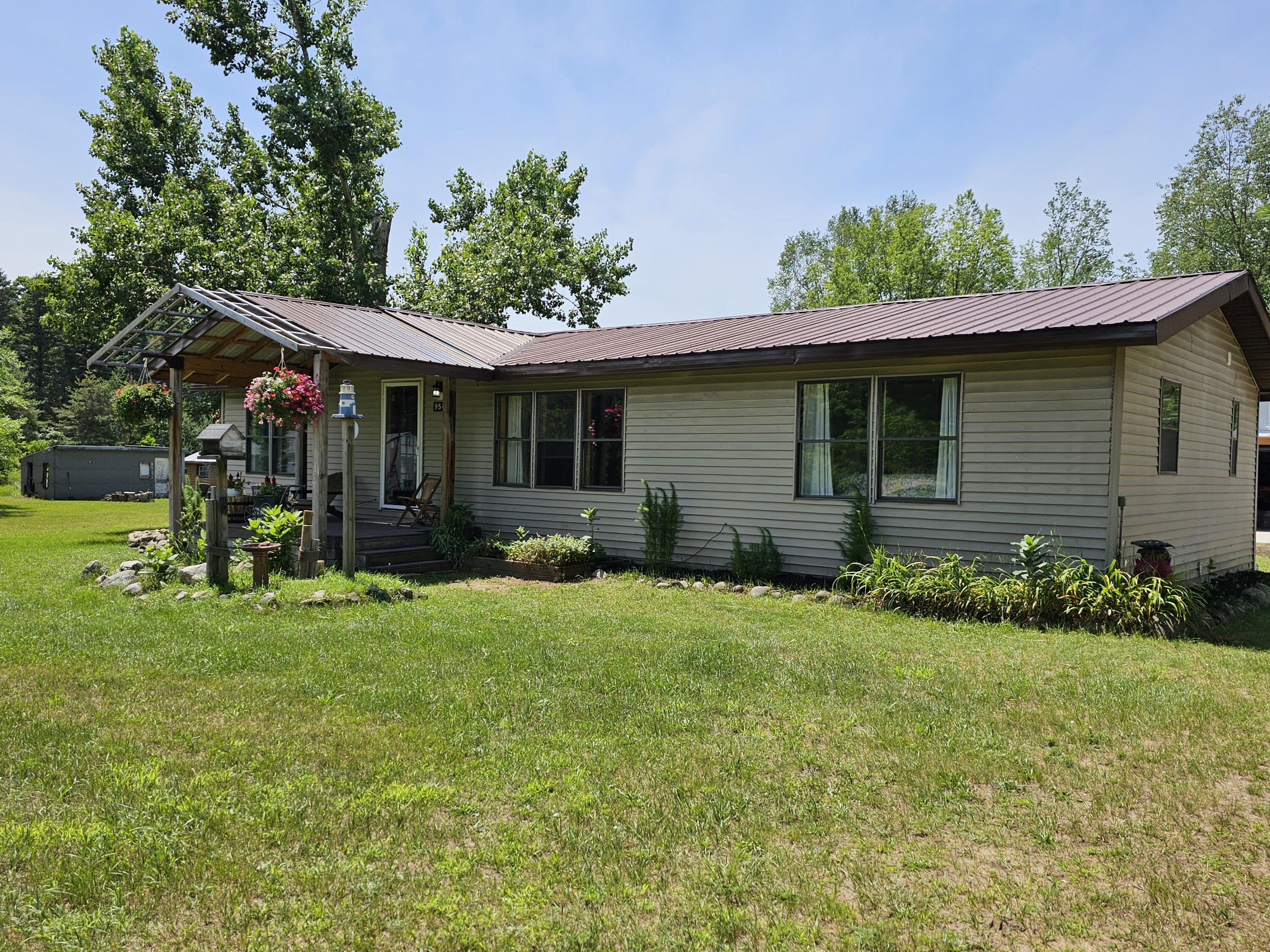 9548 Jouppi Road Kaleva, MI 49645 - Photo 3 of 35 20240709_141218