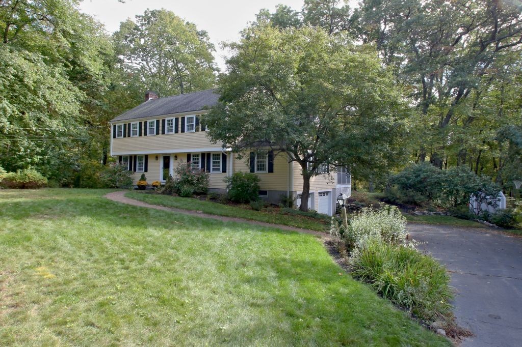 41 Campbell Road Wayland, MA 01778 - Photo 1 of 24 a front view of a house with a yard