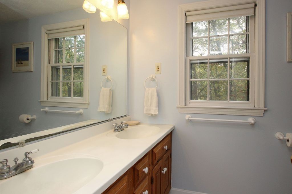 41 Campbell Road Wayland, MA 01778 - Photo 20 of 24 a bathroom with a sink and a window