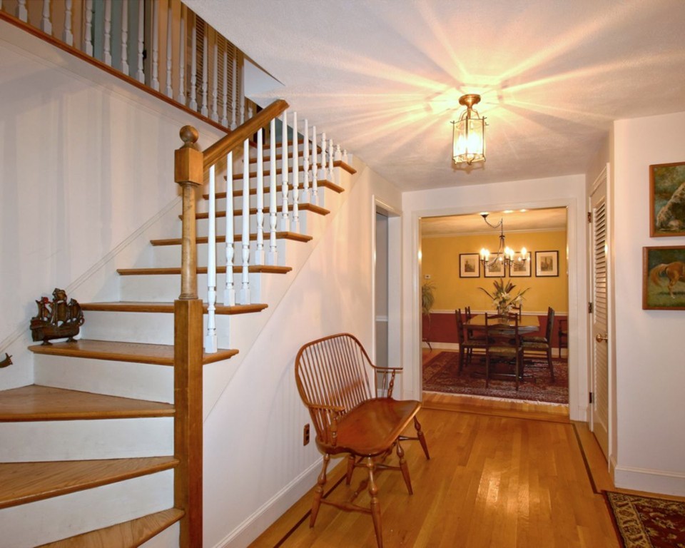 41 Campbell Road Wayland, MA 01778 - Photo 2 of 24 a view of a livingroom with furniture staircase and wooden floor