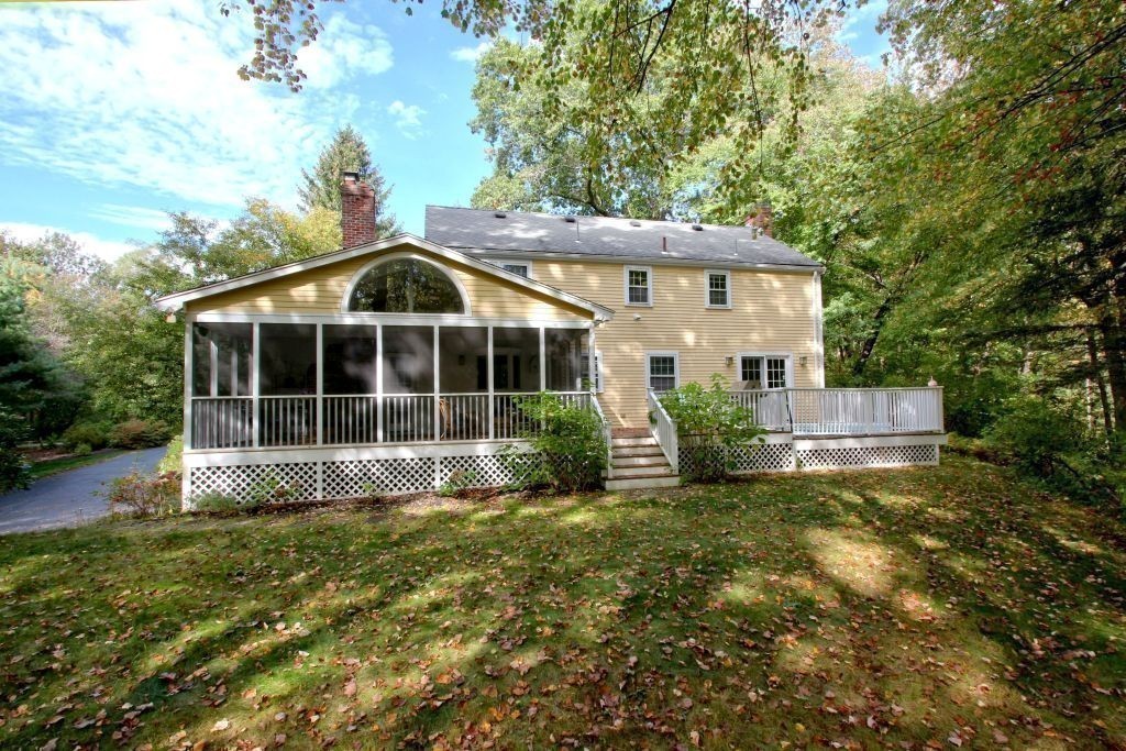 41 Campbell Road Wayland, MA 01778 - Photo 23 of 24 a view of a house with a yard and sitting area