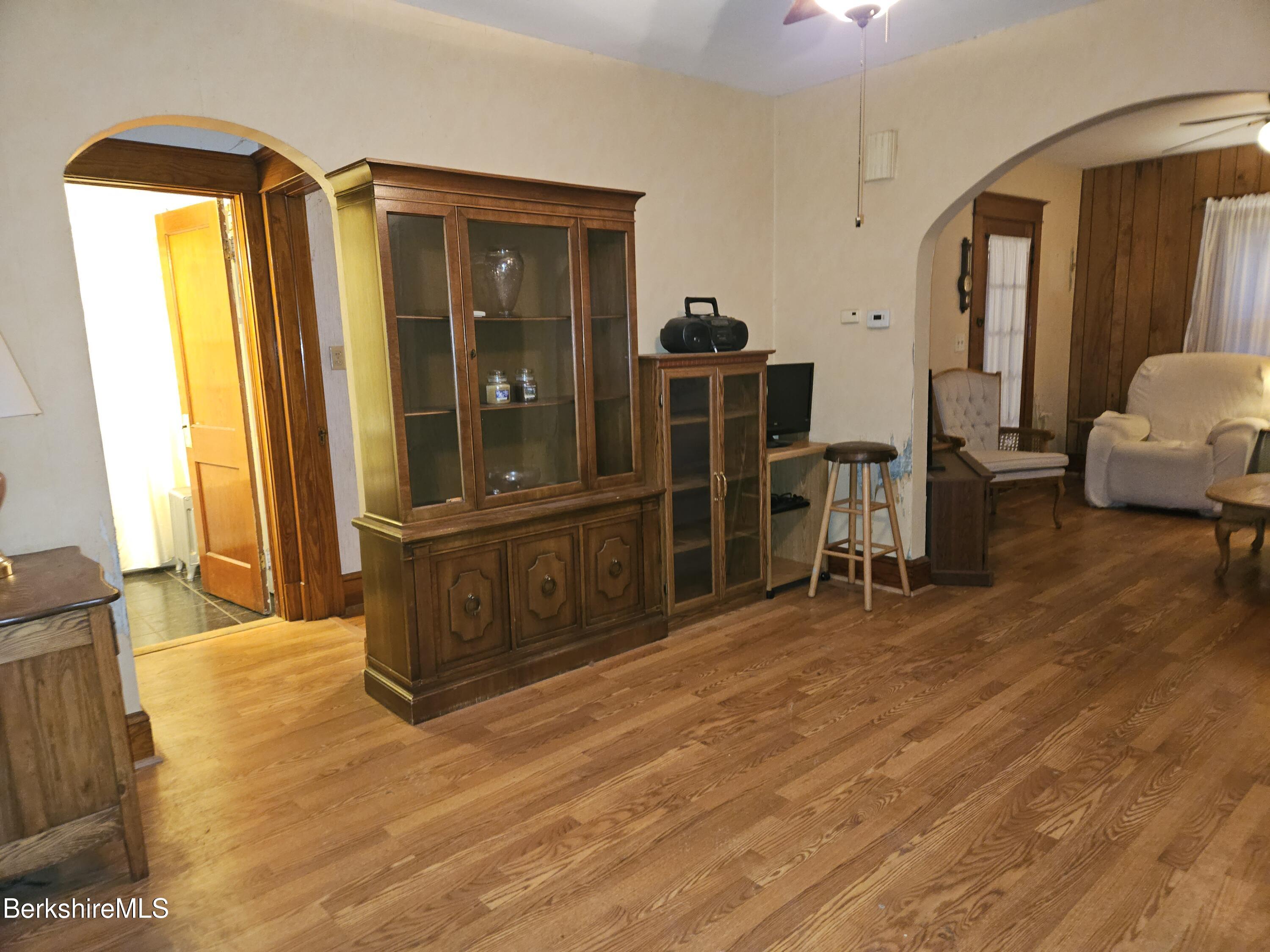 269 2nd Street Pittsfield, MA 01201 - Photo 10 of 39 a view of a room with wooden floor and furniture