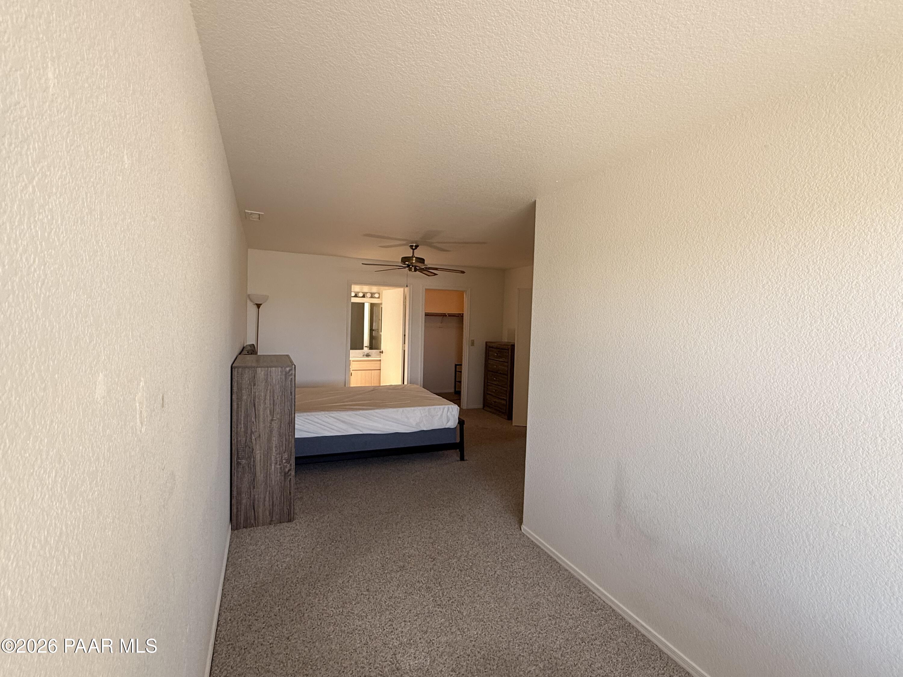 3059 Smokey Road, Unit 21E Prescott, AZ 86301 - Photo 10 of 37 Primary view of walkin closet & bath