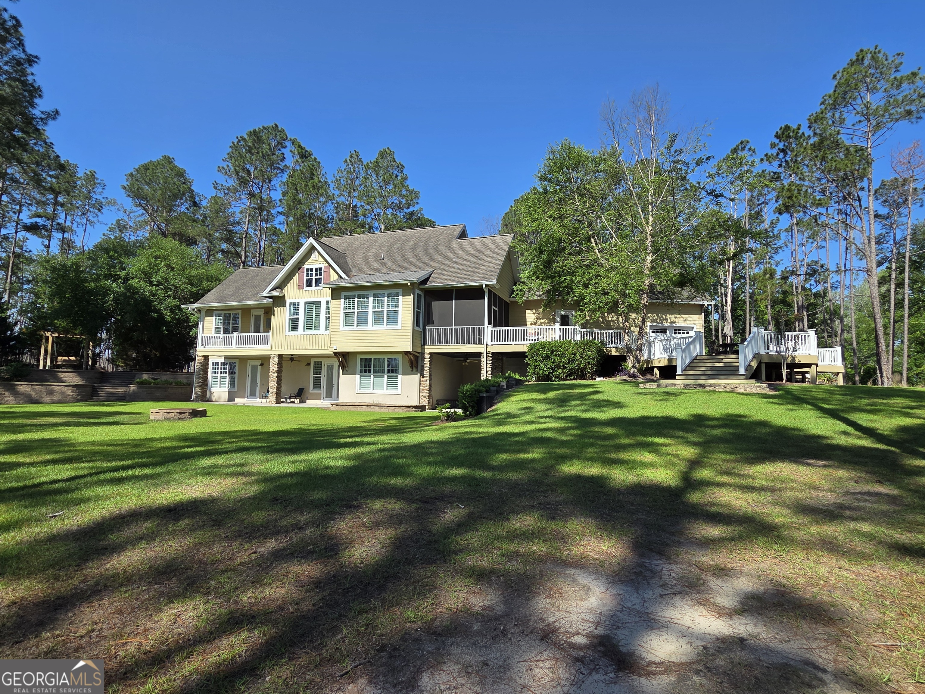 300 Hammond Powell Road Hazlehurst, GA 31539 - Photo 22 of 91 a front view of a house with a yard