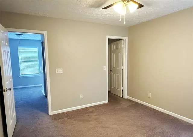 an empty room with a bathroom