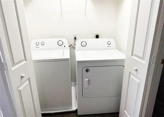 a utility room with dryer and washer