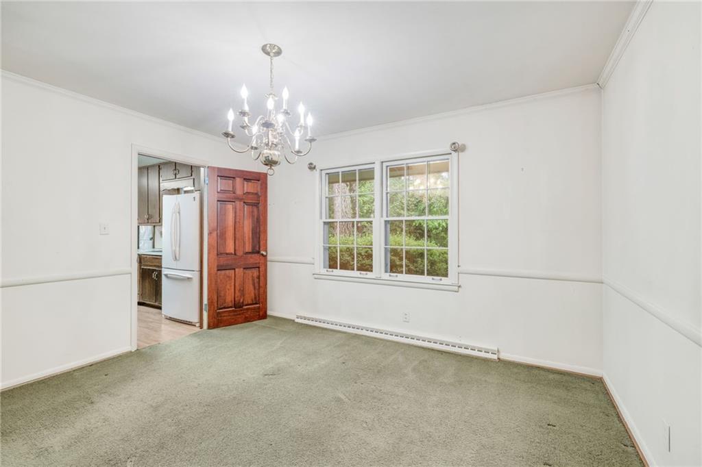 1911 Alderbrook Road Northeast Atlanta, GA 30345 - Photo 10 of 33 a view of an empty room with a window