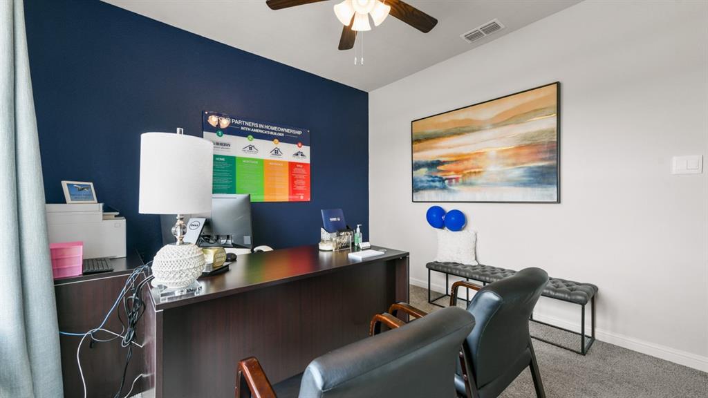 244 Kinley Street Grandview, TX 76050 - Photo 23 of 32 a room with a table chairs and a workspace