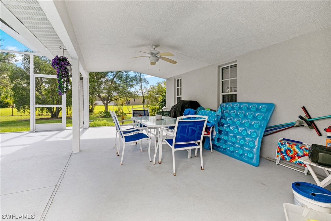 17571 Oak Creek Road Alva, FL 33920 - Photo 31 of 49 a view of a livingroom with furniture and a large window