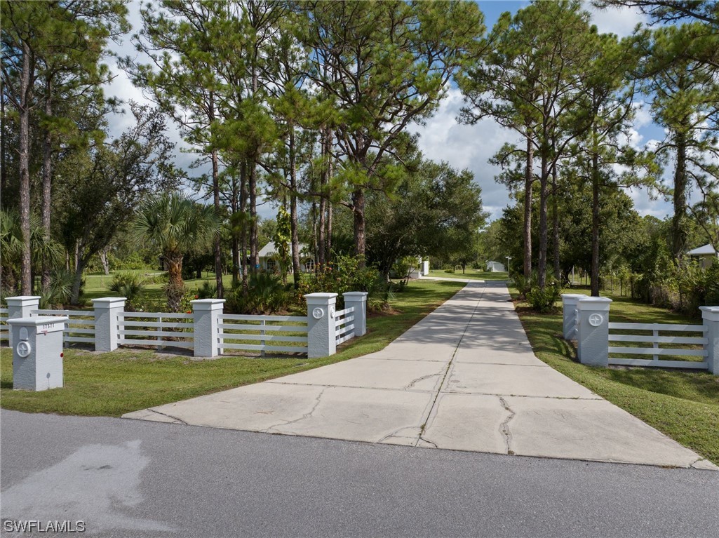 17571 Oak Creek Road Alva, FL 33920 - Photo 40 of 49 a park view with large trees