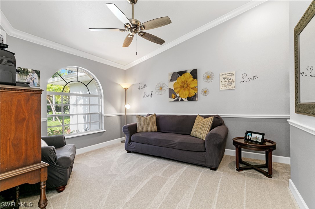 17571 Oak Creek Road Alva, FL 33920 - Photo 8 of 49 a living room with furniture and a window
