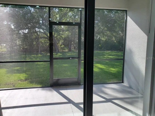 a view of swimming pool from a balcony