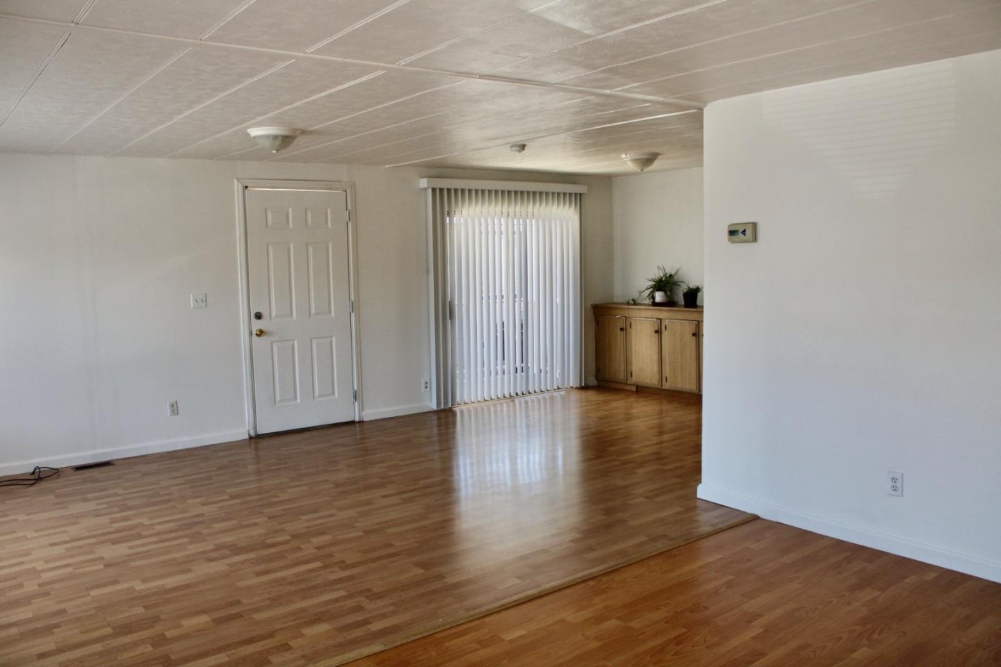 1358 Oakland Road, Unit 47 San Jose, CA 95112 - Photo 5 of 9 a view of a livingroom with wooden floor