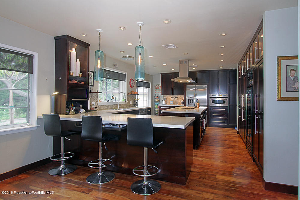 3775 Shadow Grove Road Pasadena, CA 91107 - Photo 11 of 33 a view of a kitchen with dining room