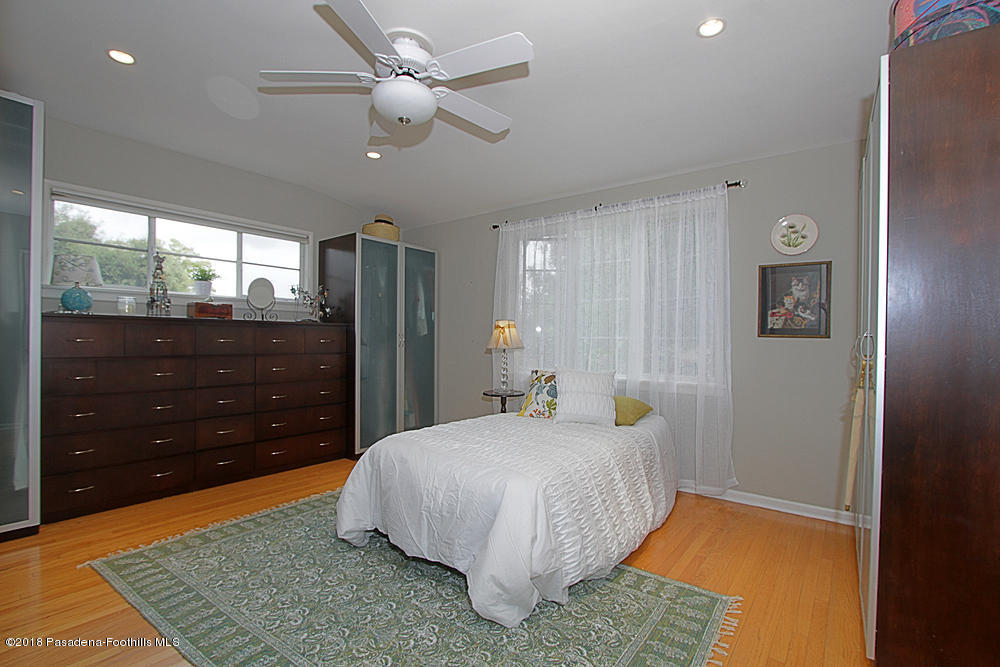 3775 Shadow Grove Road Pasadena, CA 91107 - Photo 16 of 33 a bedroom with a bed and a dresser