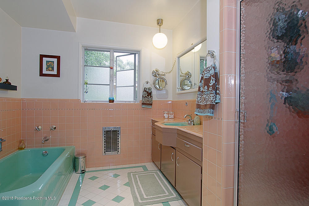 3775 Shadow Grove Road Pasadena, CA 91107 - Photo 18 of 33 a bathroom with a sink mirror and window